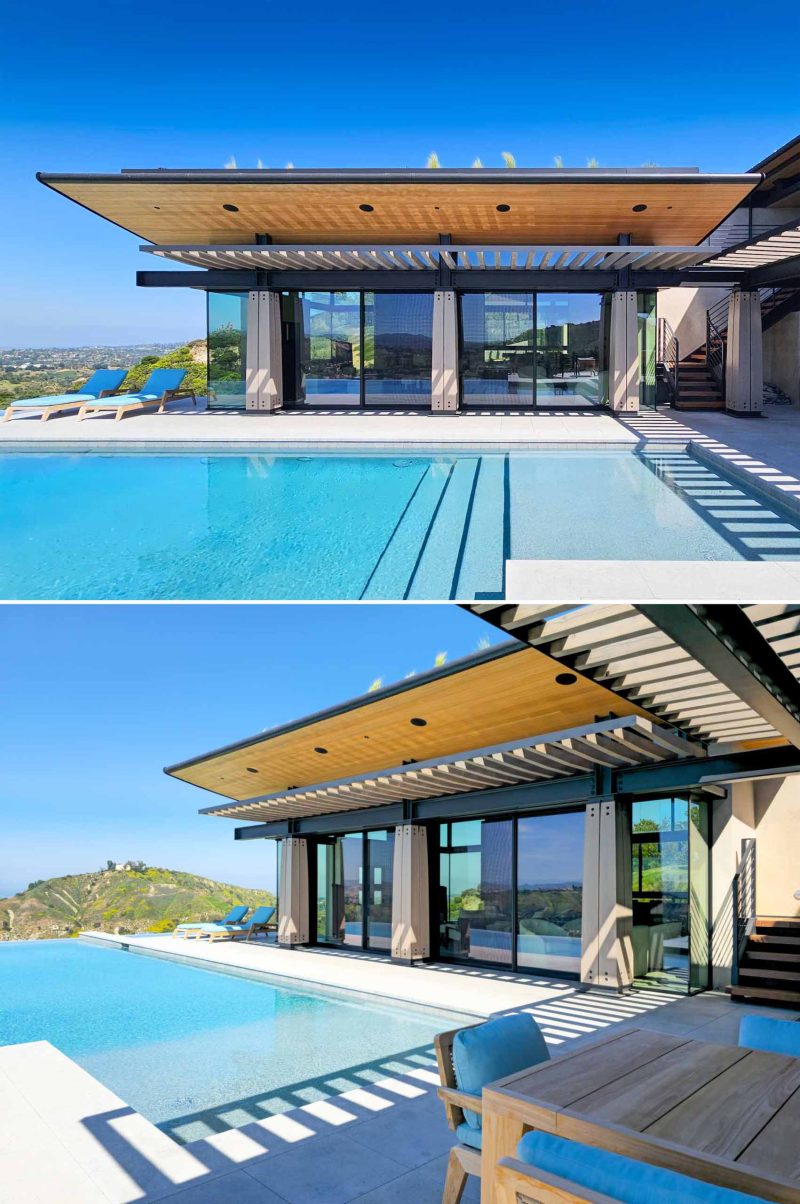 Steel, Wood, And Stone Are On Display Inside This Hillside Home
