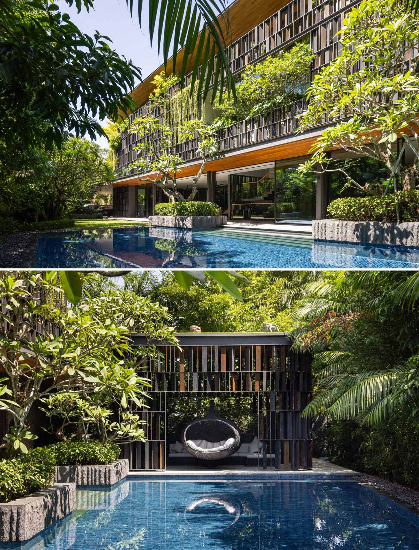 A modern house in Singapore that has plants and shade screens integrated into its design, and a pool for relaxing on a hot day.