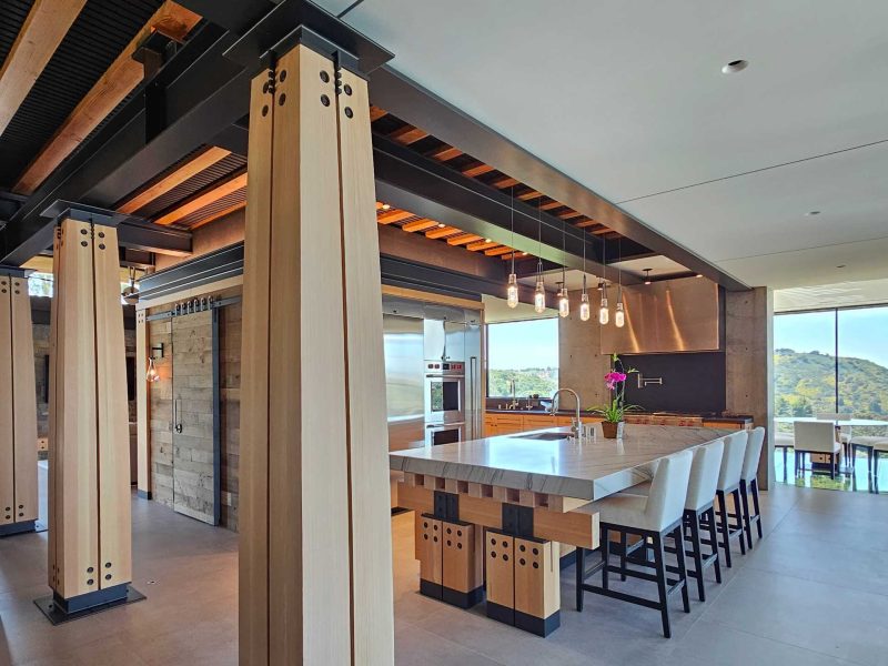 Neo Rustic Steel, Wood, And Stone Are On Display Inside This Hillside Home