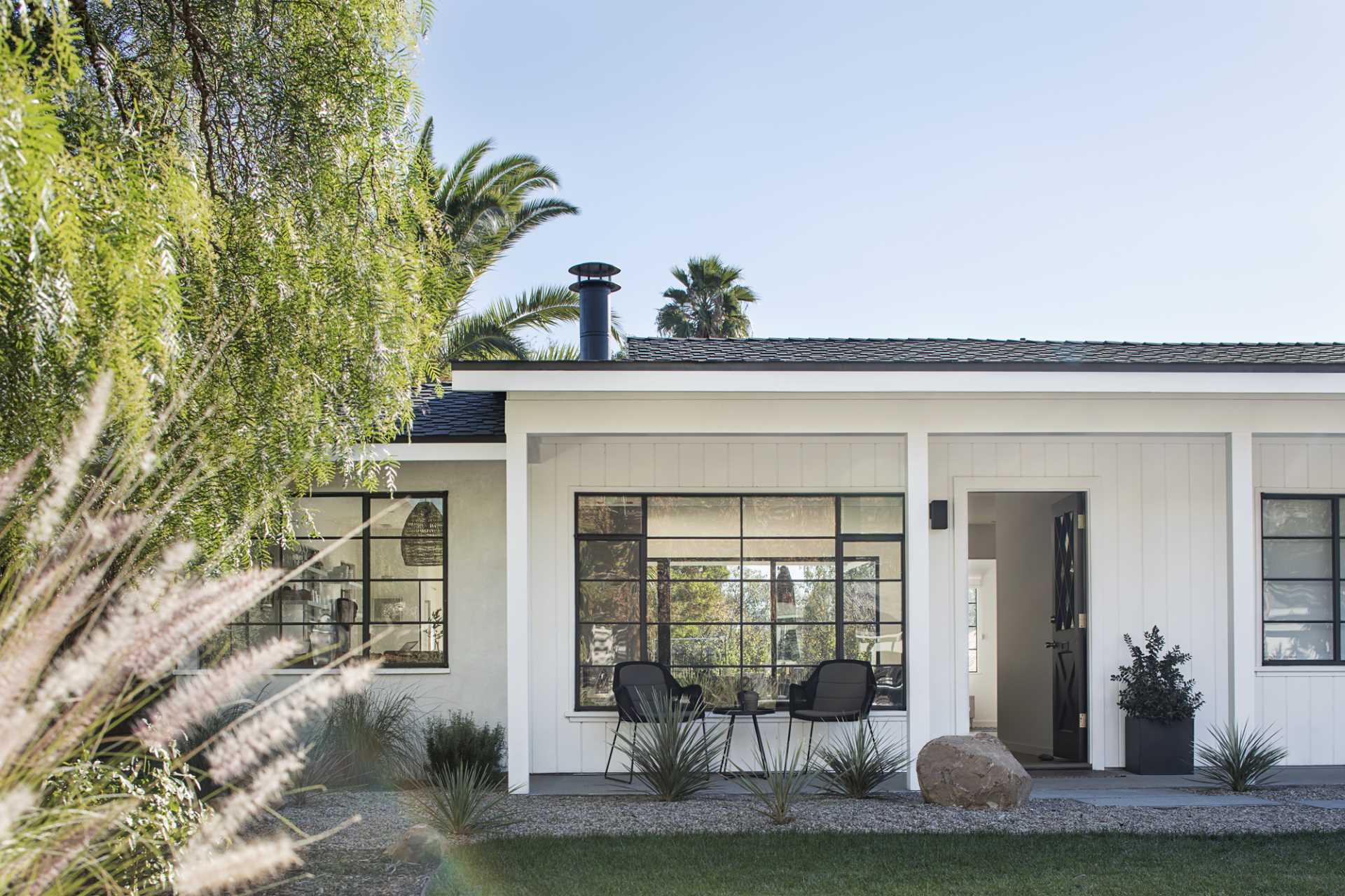 A renovated ranch home with a black and white colour palette.