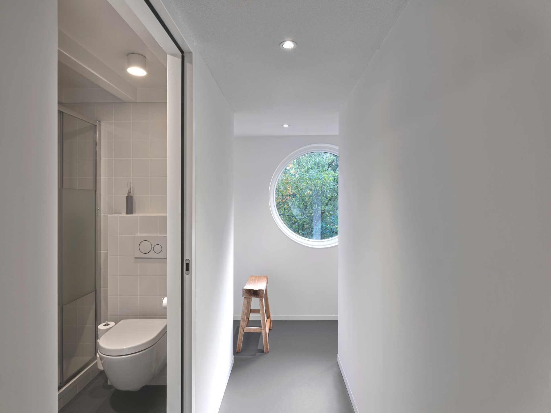 The bathroom in a small elevated cabin.