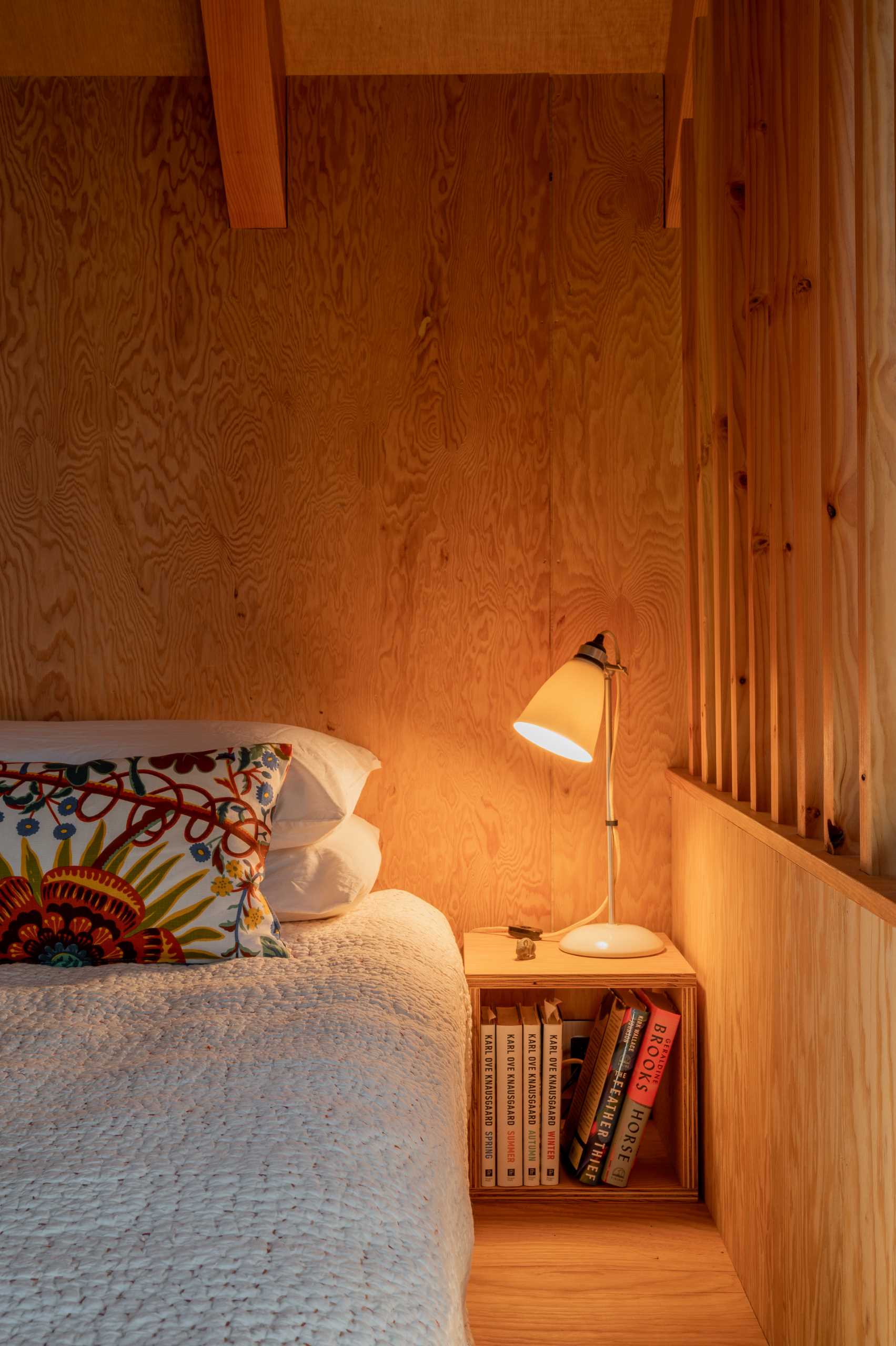 The bedrooms in this cabin are located on either side of the lounge area, with both bunk beds and regular beds. Curtains can be drawn to provide privacy when needed.