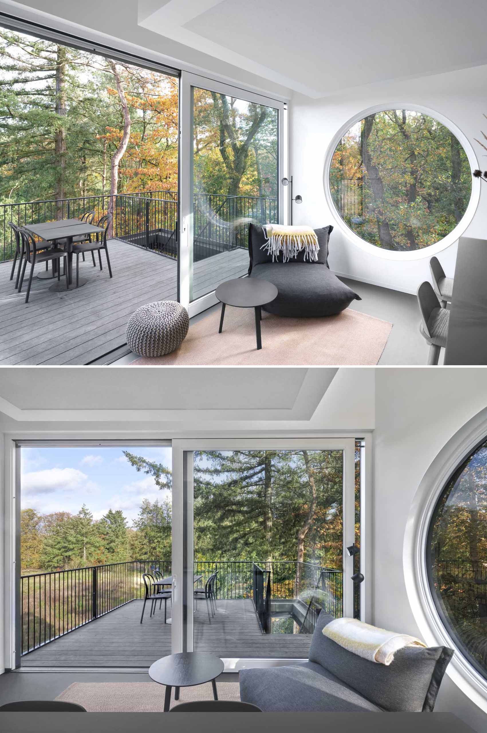 The living room and kitchen of a small elevated cabin.