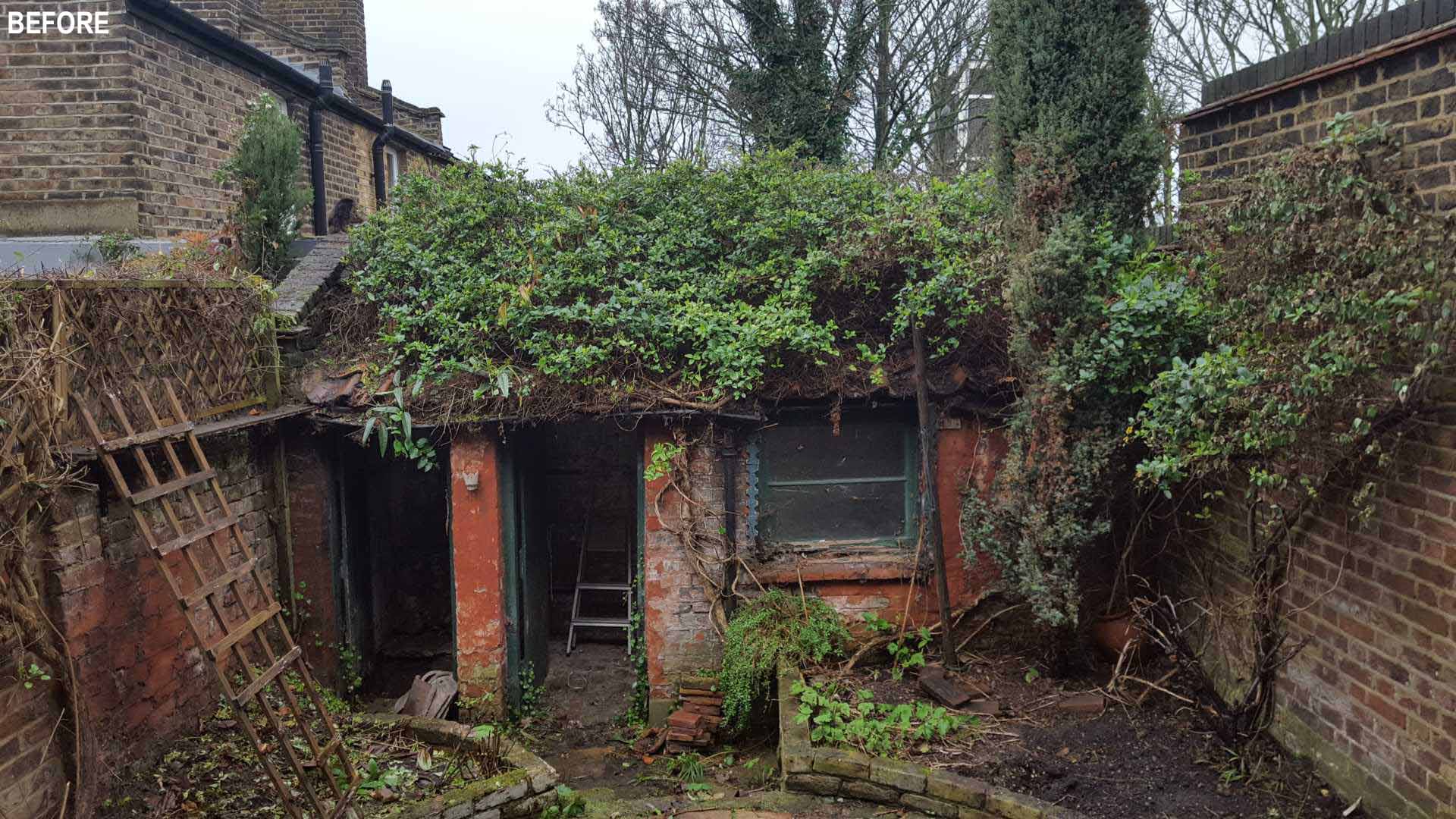 BEFORE - A new garden studio for a writer that includes a green roof, sitting area, built-in shelving, and a bathroom.