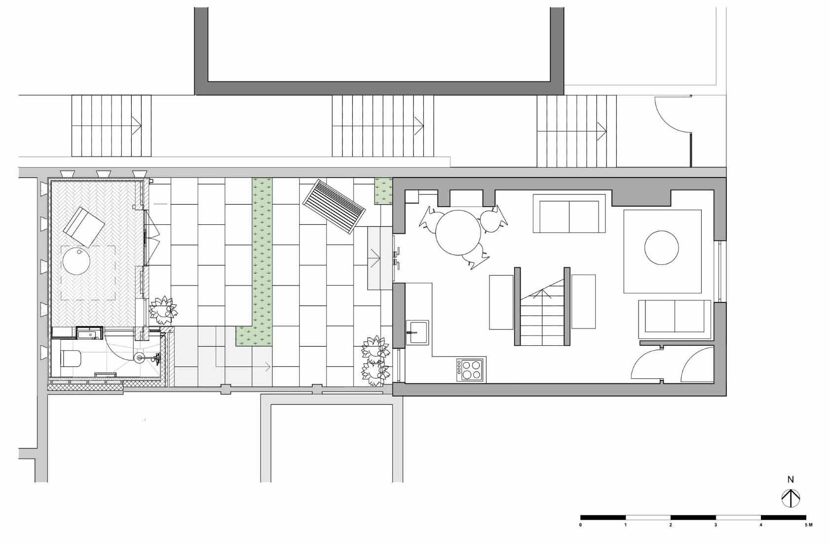 A new garden studio for a writer that includes a green roof, sitting area, built-in shelving, and a bathroom.