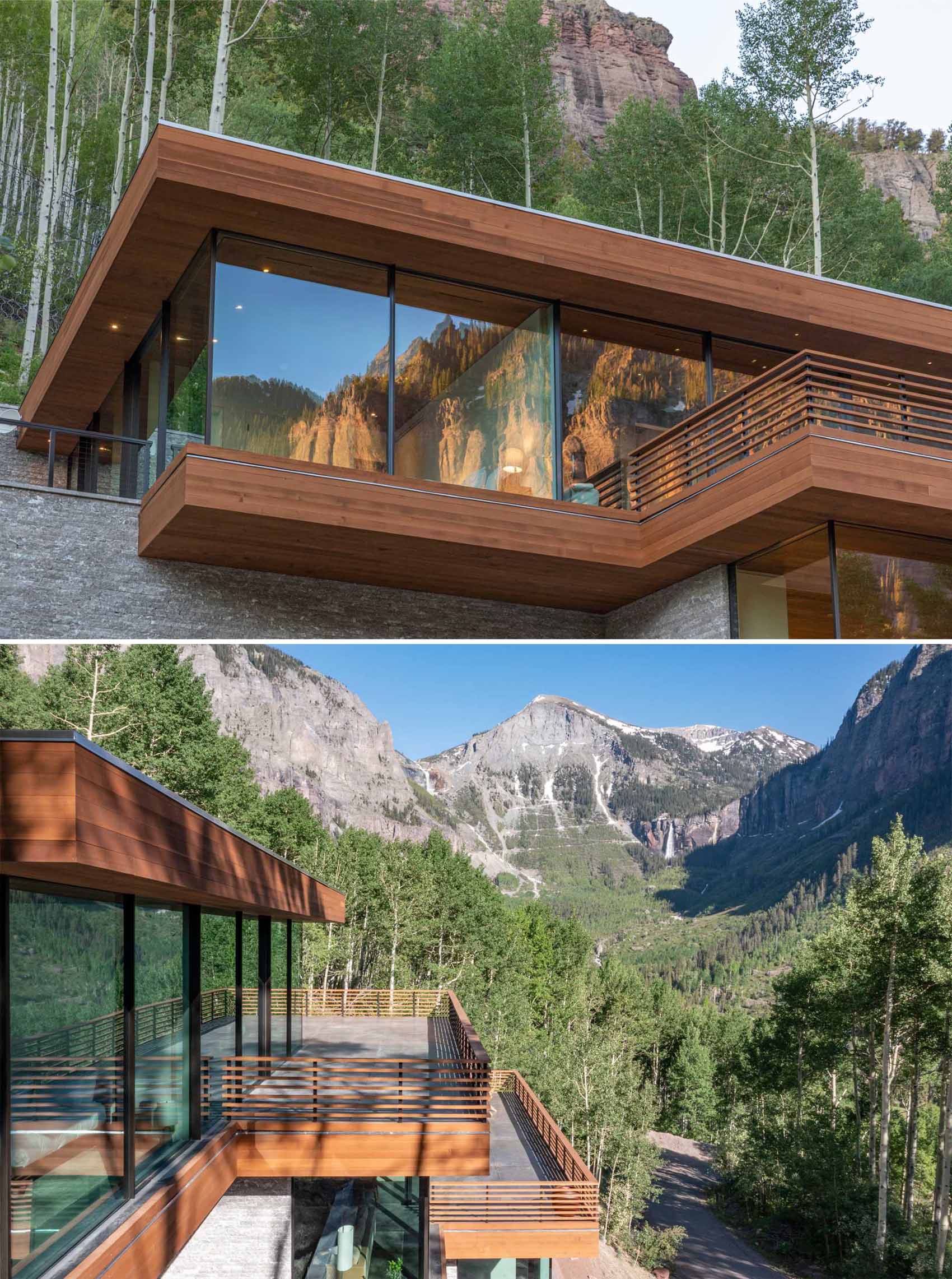 A modern home nestled into the steep cliffs appears as three cantilevered glass boxes.