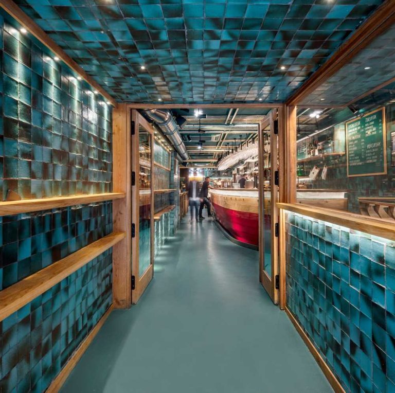 Handmade Turquoise Tiles Line The Entrance To This Spanish Restaurant