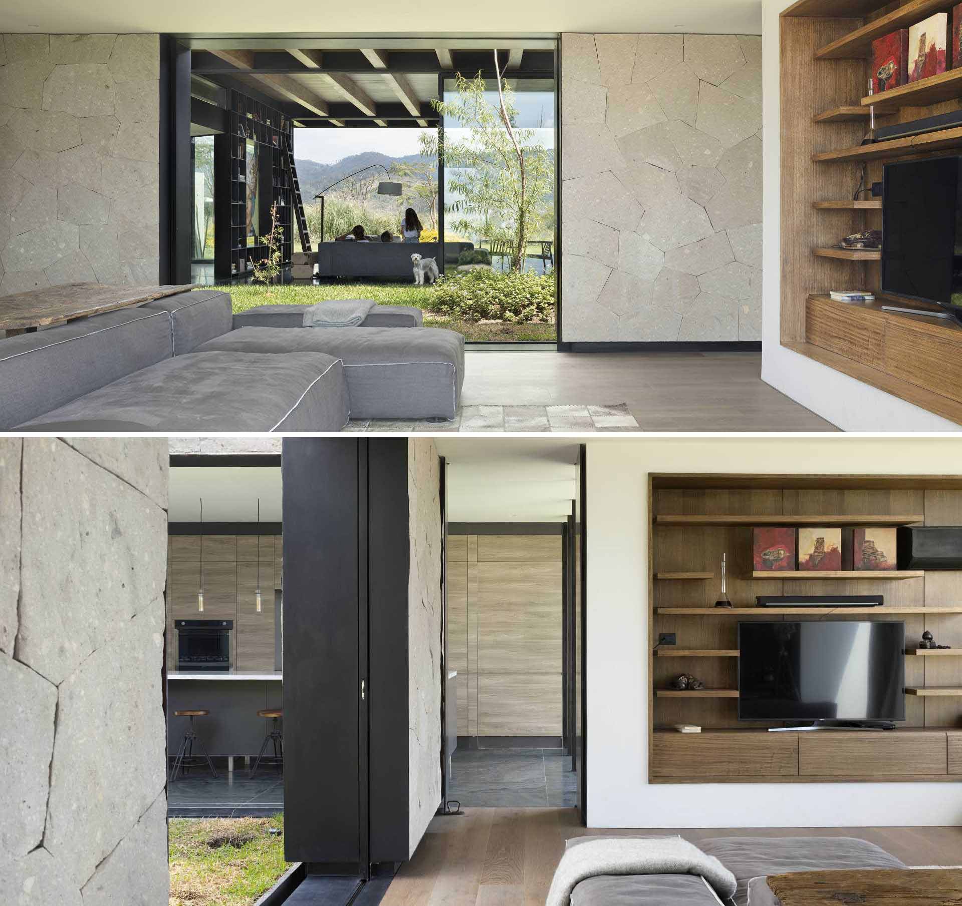 A modern TV room with a recessed wood-line niche that houses the TV and shelving.