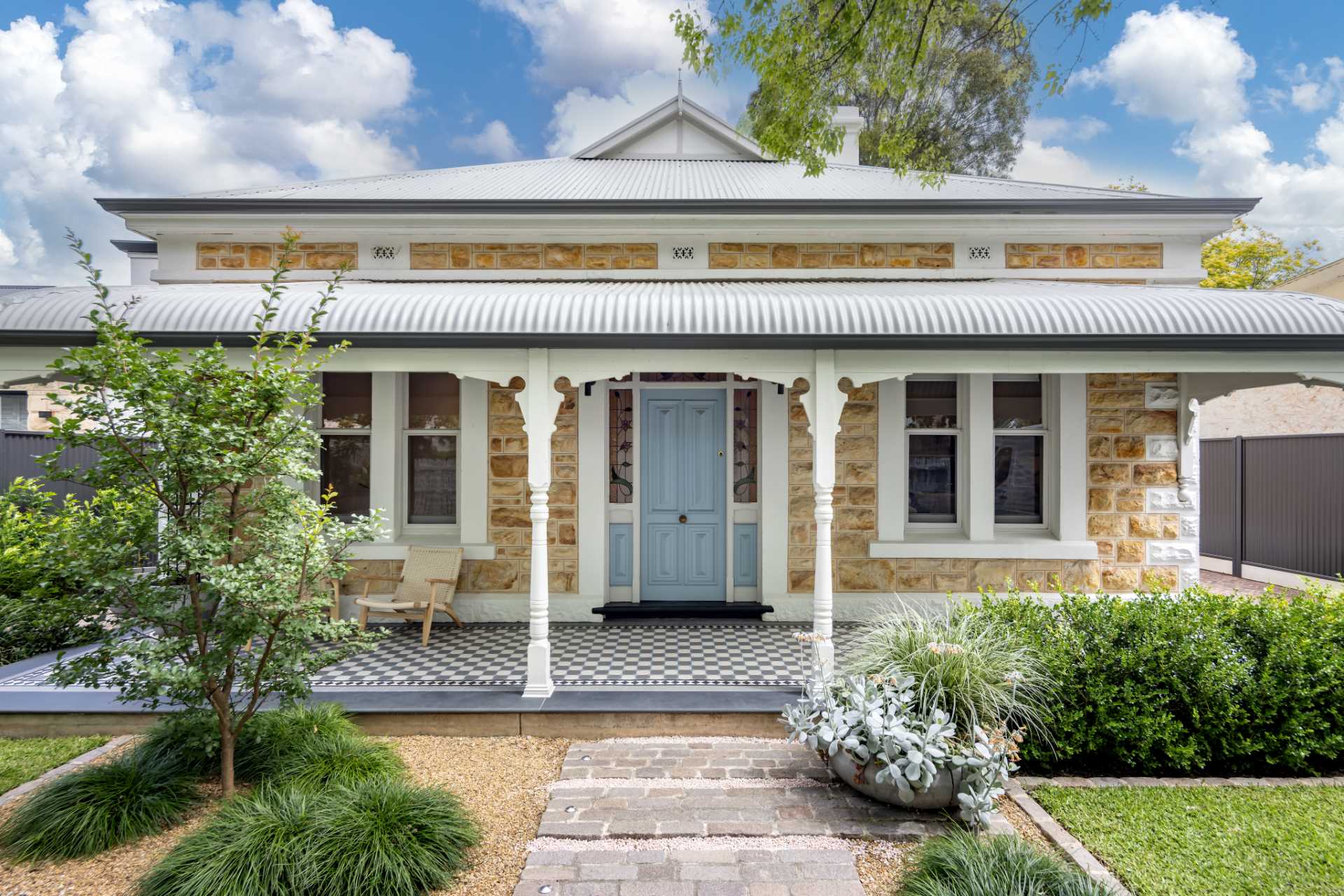 An original 1890s sandstone cottage in Australia.