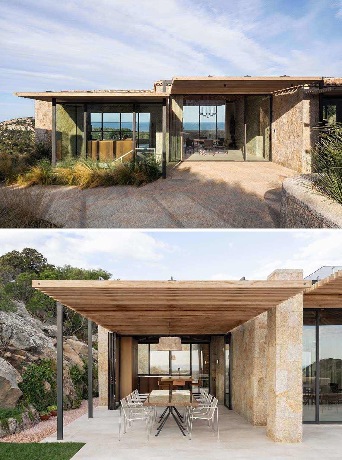 Glass walls, with some that open, connect the outdoor spaces to the interior, while at the same time, providing unobstructed water views.