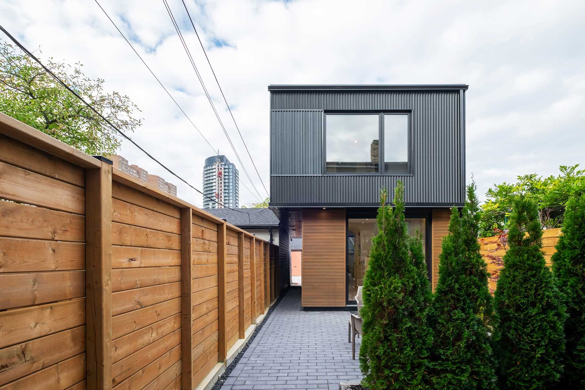 From the patio, you can see how the second floor of the laneway house cantilevers outward, which provides an additional 3 feet of livable space inside.