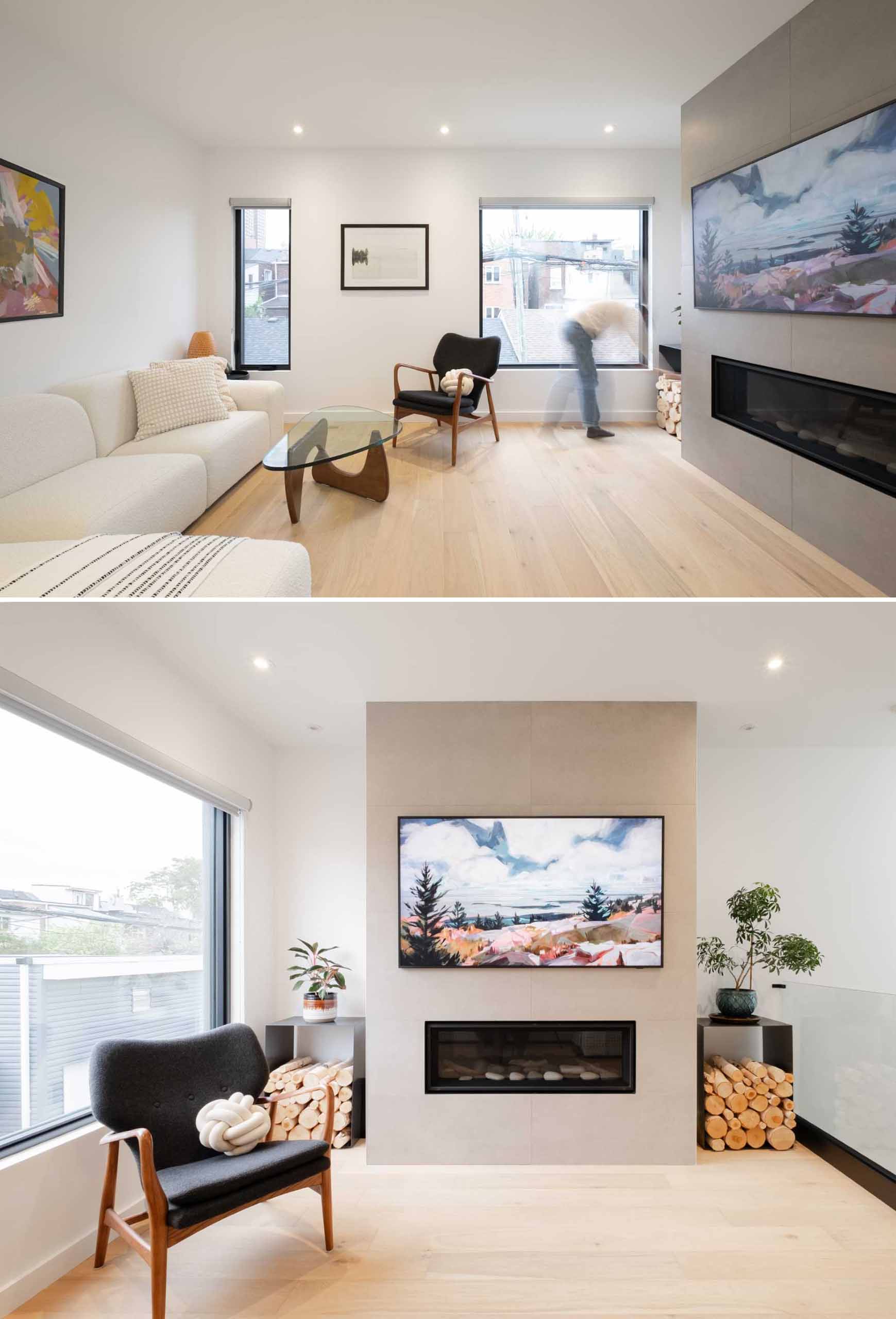 A two-storey laneway house with a small living room that has a fireplace.