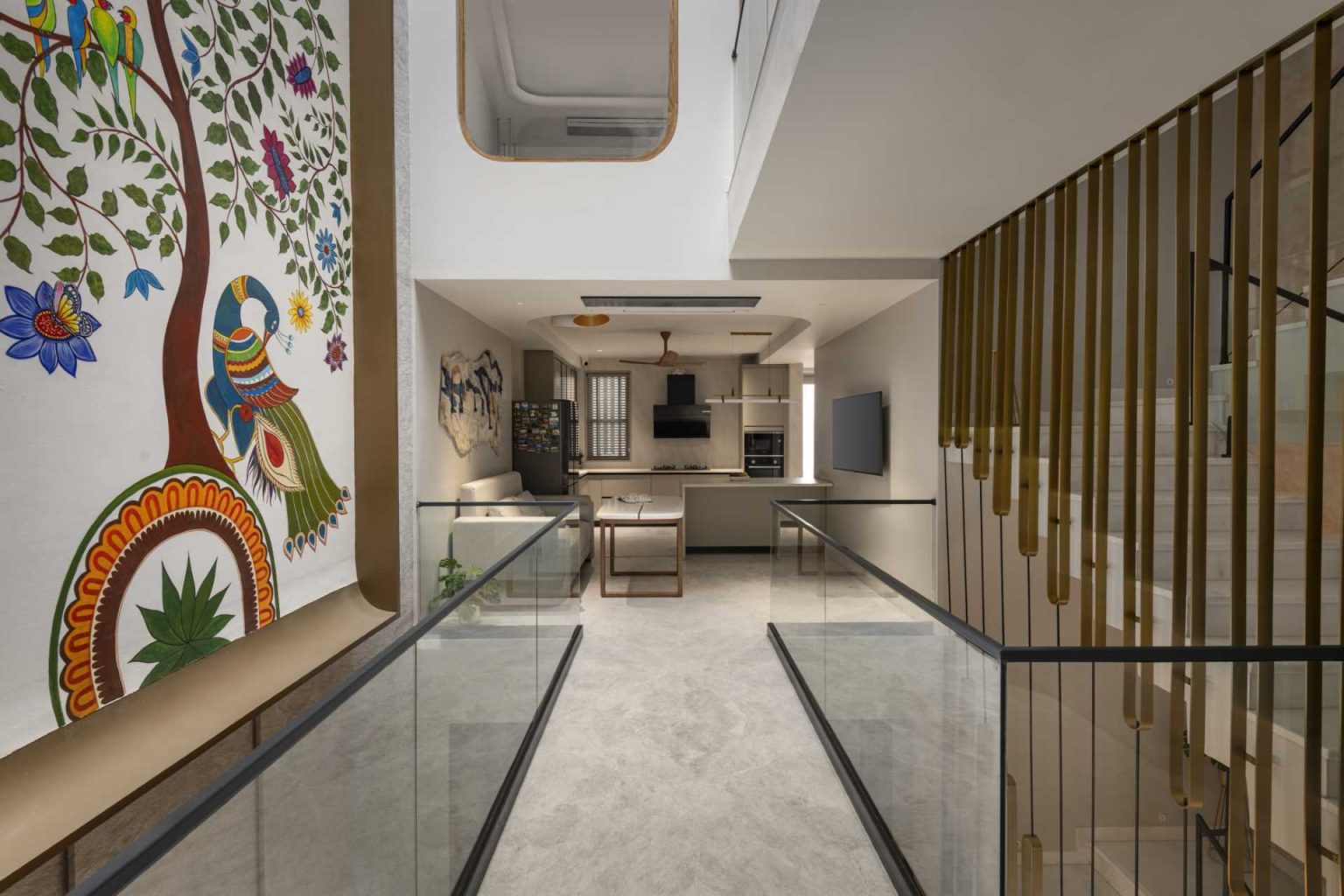 A Large Mural Adds Color To The Interior Of This Narrow Home