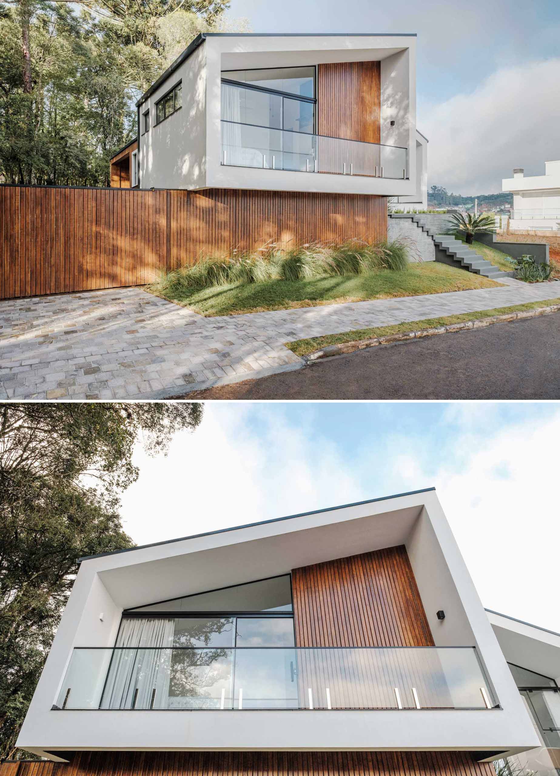 The design of this modern home shows off a modern reinterpretation of the gabled roof archetype.