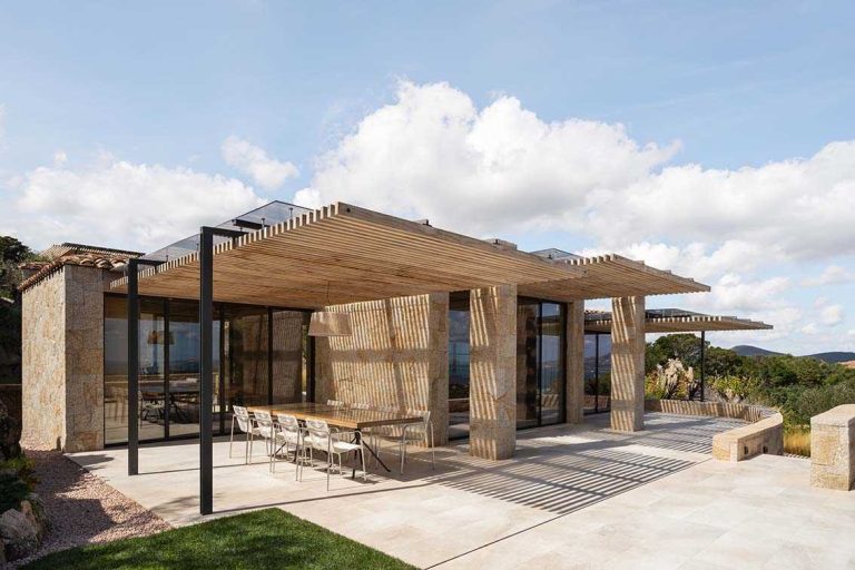 Yellow Granite Is On Display Throughout This Contemporary Home In Sardinia