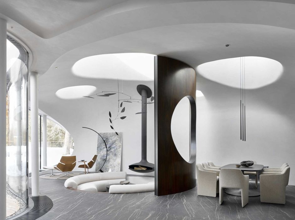 This Sculptural Home Is Full Of Curves And Surrounded By Landscaping