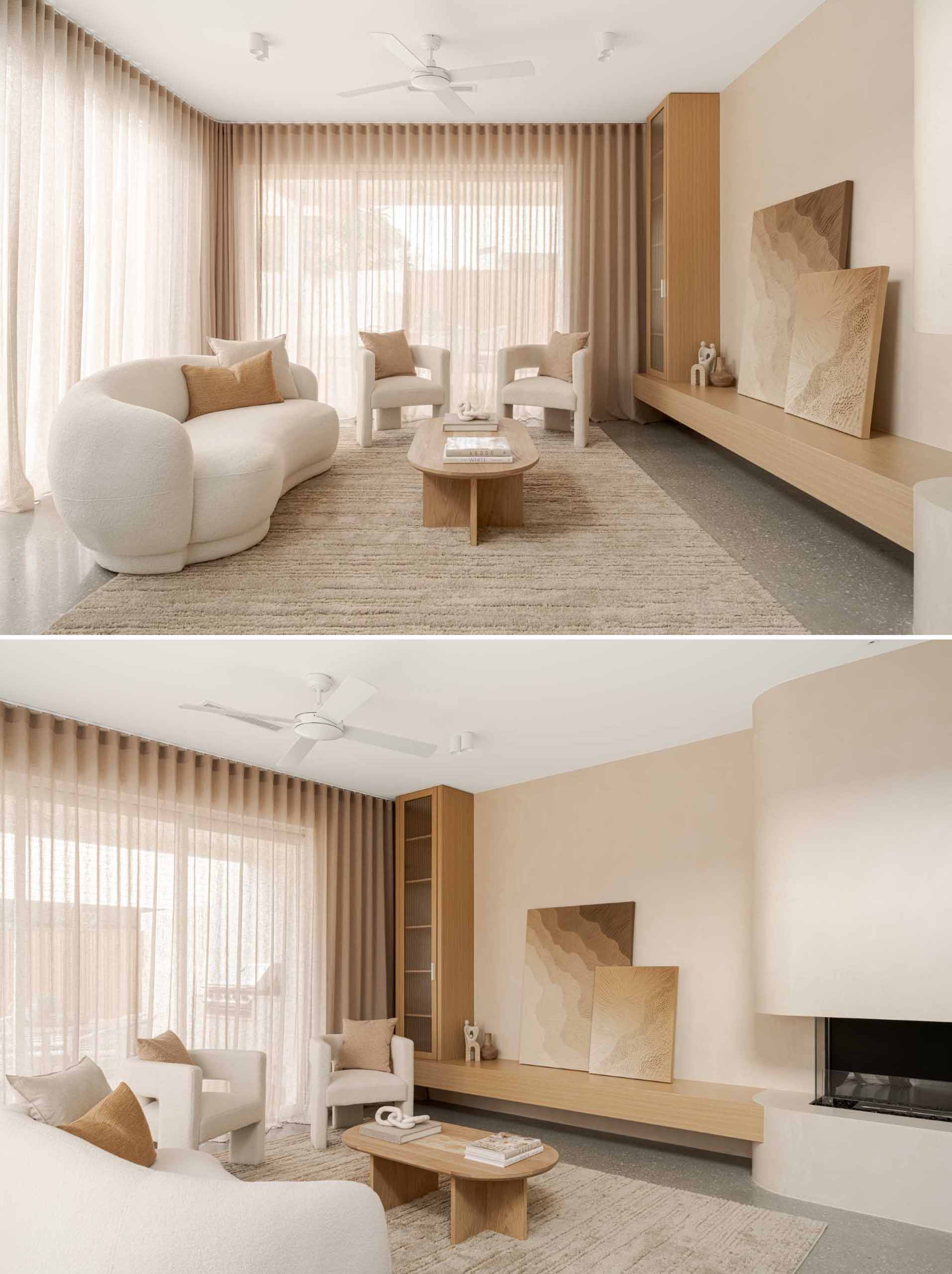 In this living room, calm tones and ،ic curves have combined with natural woods, while floor-to-ceiling curtains add a soft element.
