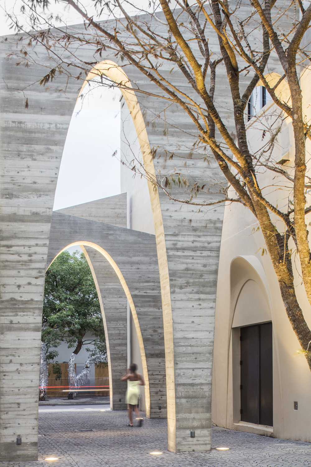 A series of arches were added to a nondescript alley to create an art installation that added life to the area.