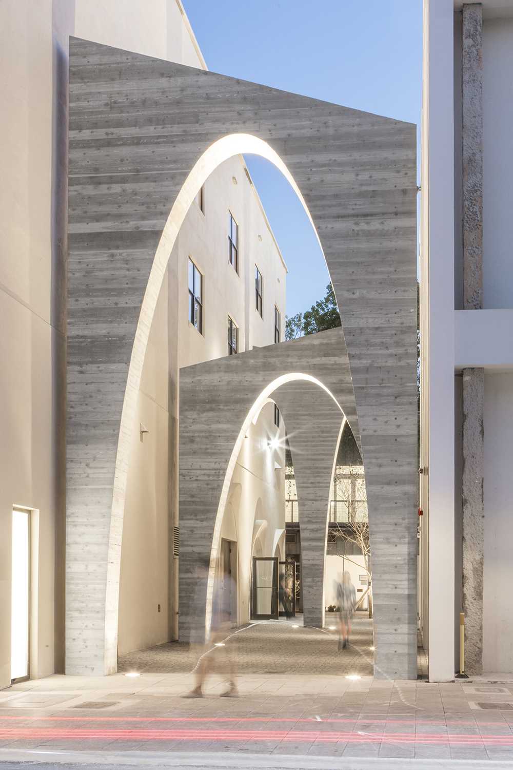 A series of arches were added to a nondescript alley to create an art installation that added life to the area.