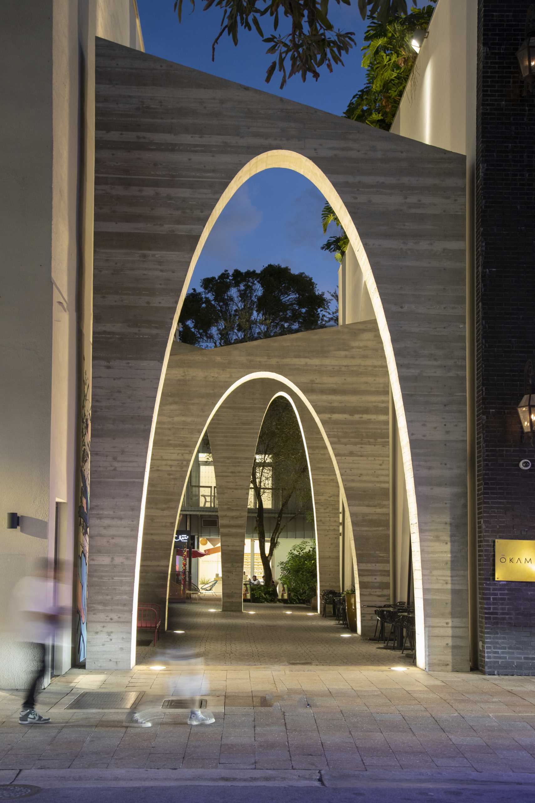 A series of arches were added to a nondescript alley to create an art installation that added life to the area.