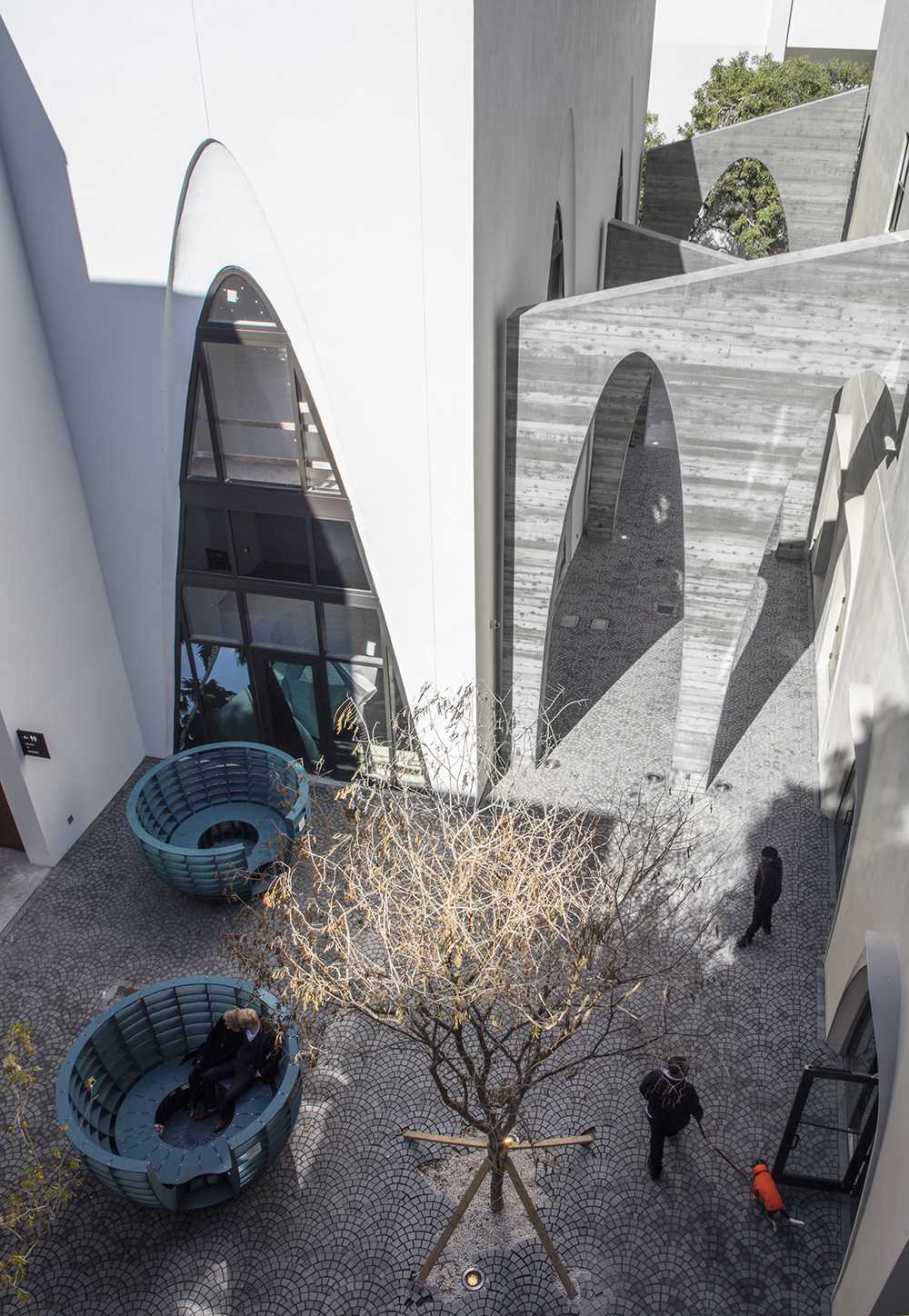 A series of arches were added to a nondescript alley to create an art installation that added life to the area.