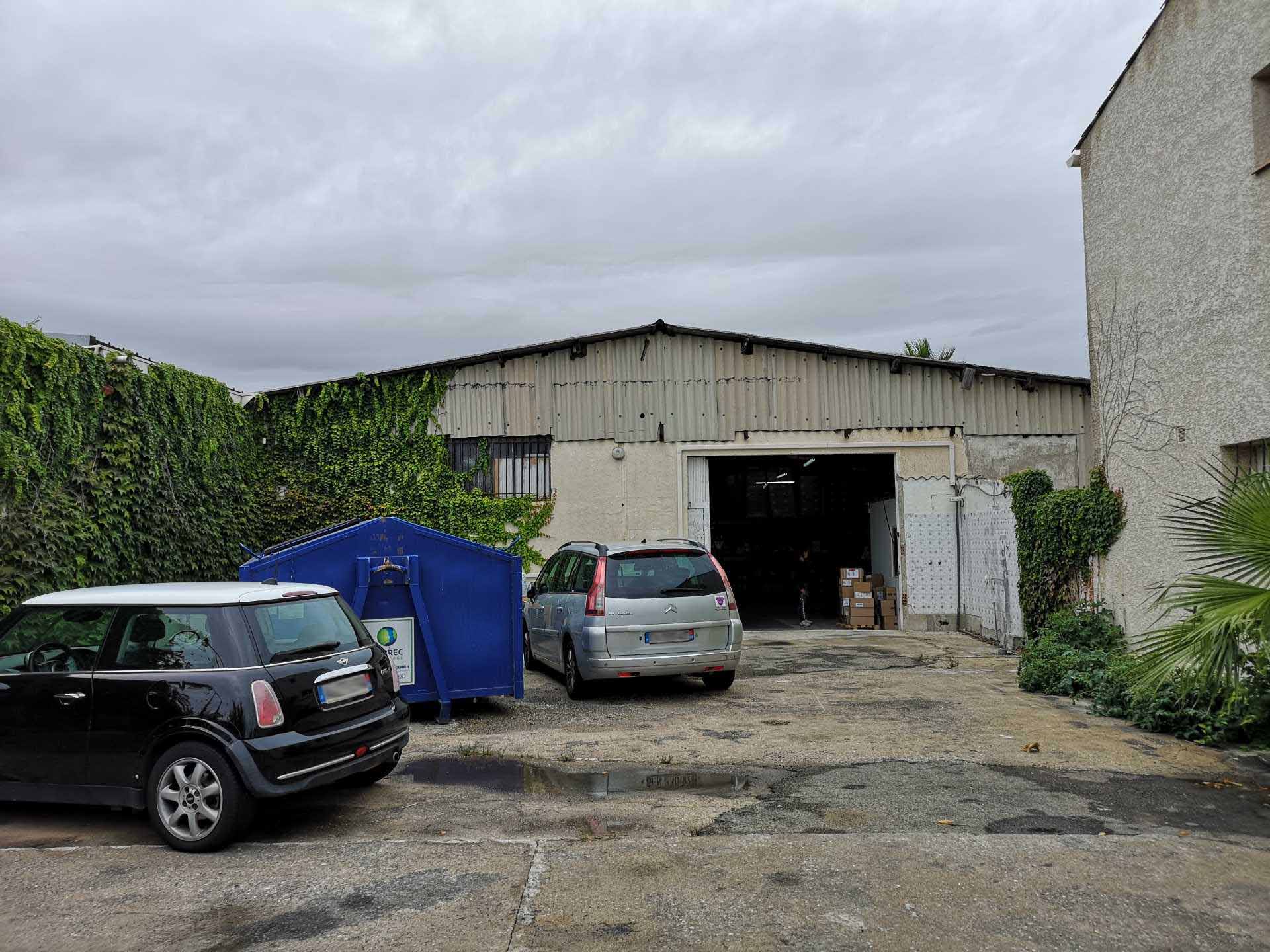 BEFORE Photo - This warehouse was converted into a modern industrial-inspired home with walls of glass.