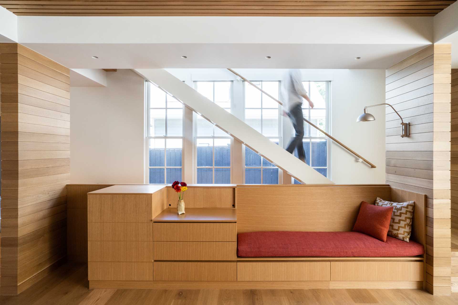 A modern built-in bench with storage.