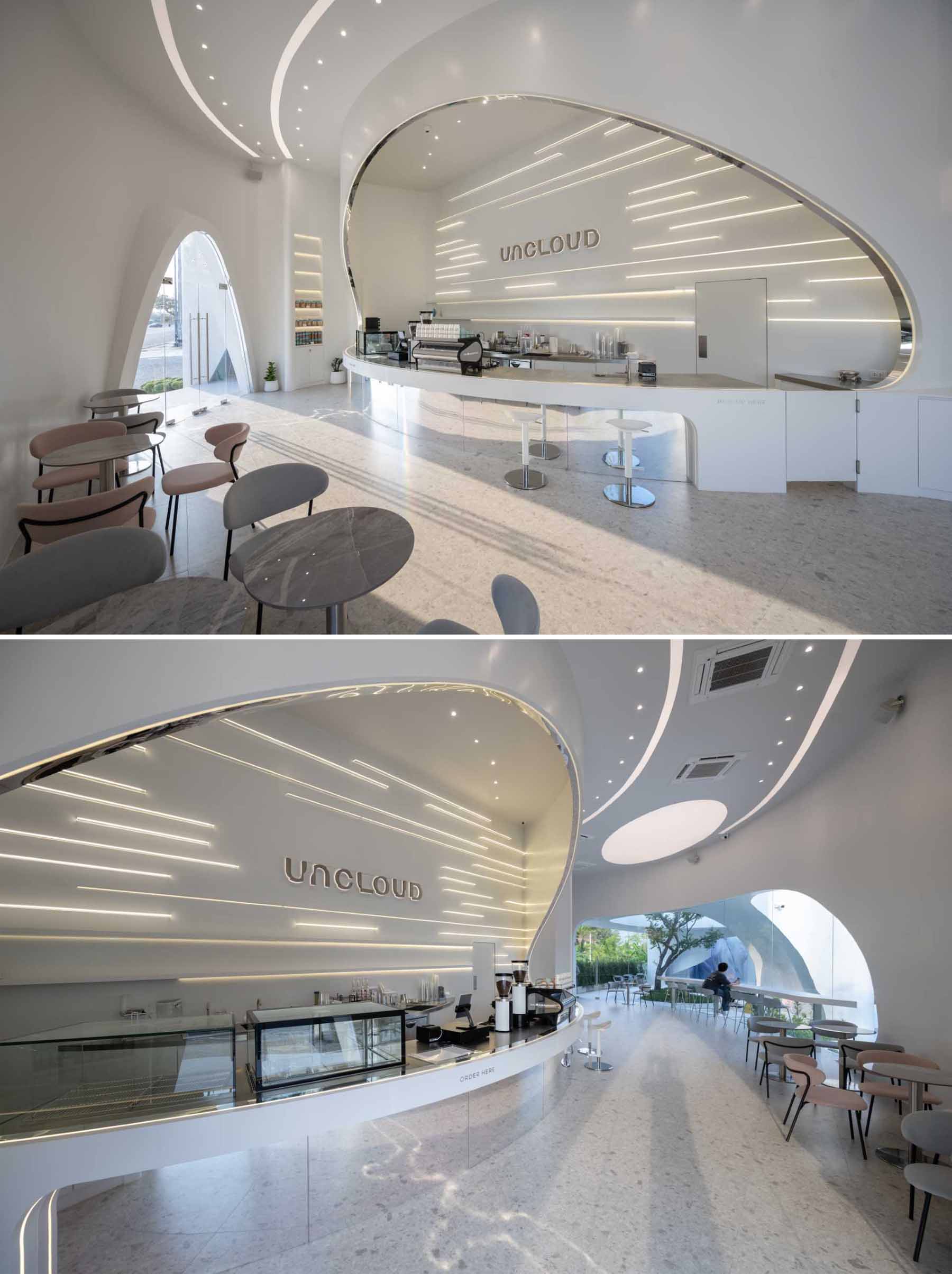 A modern coffee shop where LED lighting highlights the curves and seating areas.