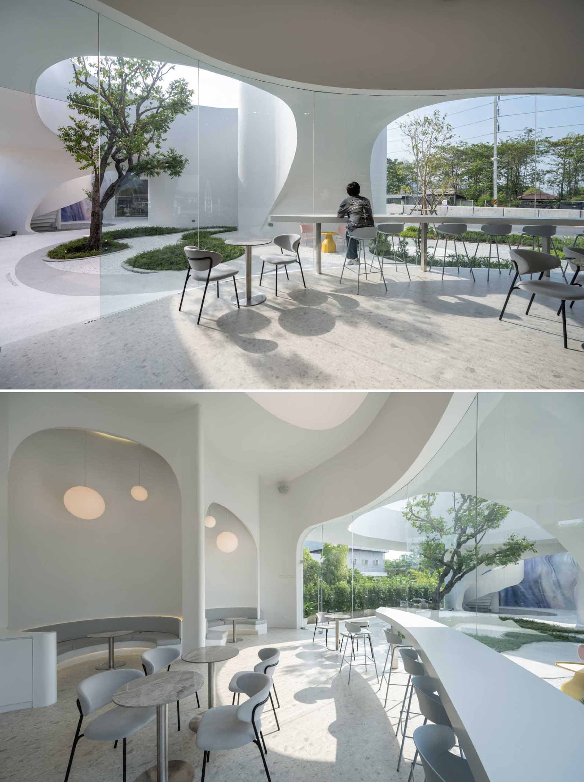 A modern coffee shop where LED lighting highlights the curves and seating areas.