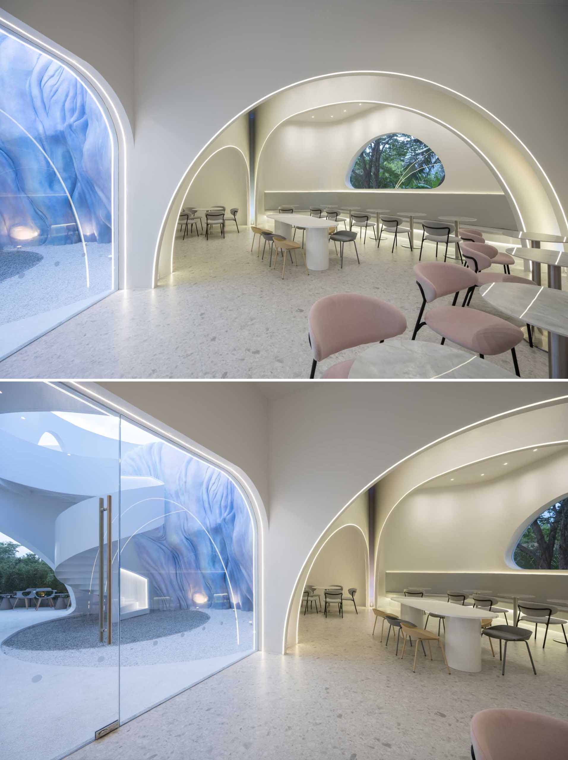 A modern coffee shop where LED lighting highlights the curves and seating areas.