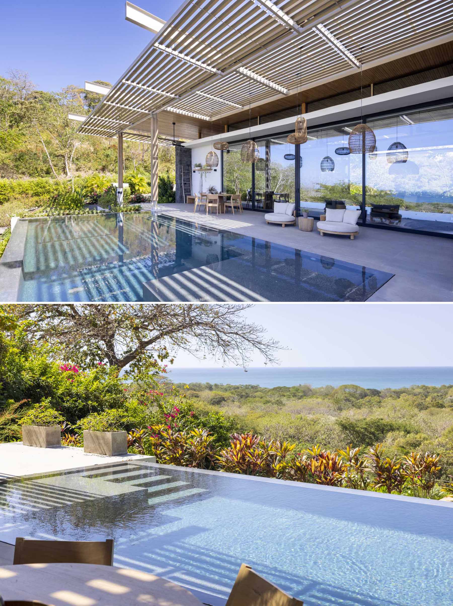 The pergola, which has oversized pendant lights and fans hanging above seating and dining areas, connects with the living room inside, and the swimming pool with views of the ocean.