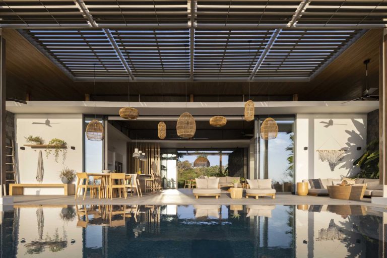 A Large Pergola Helps This Home Seamlessly Blend Indoor And Outdoor Spaces