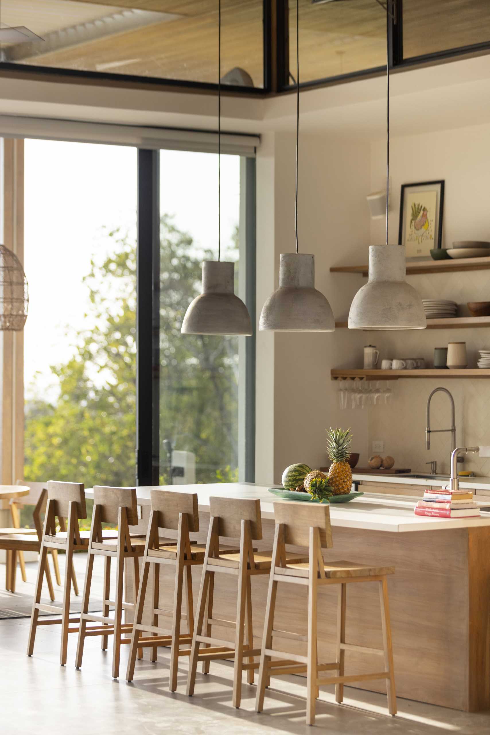 A large kitchen island enables plenty of room for casual gatherings and cooking.