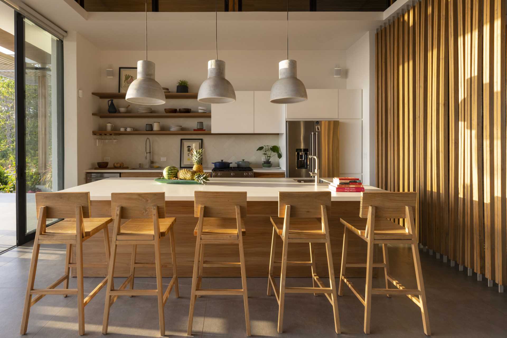 A large kitchen island enables plenty of room for casual gatherings and cooking.