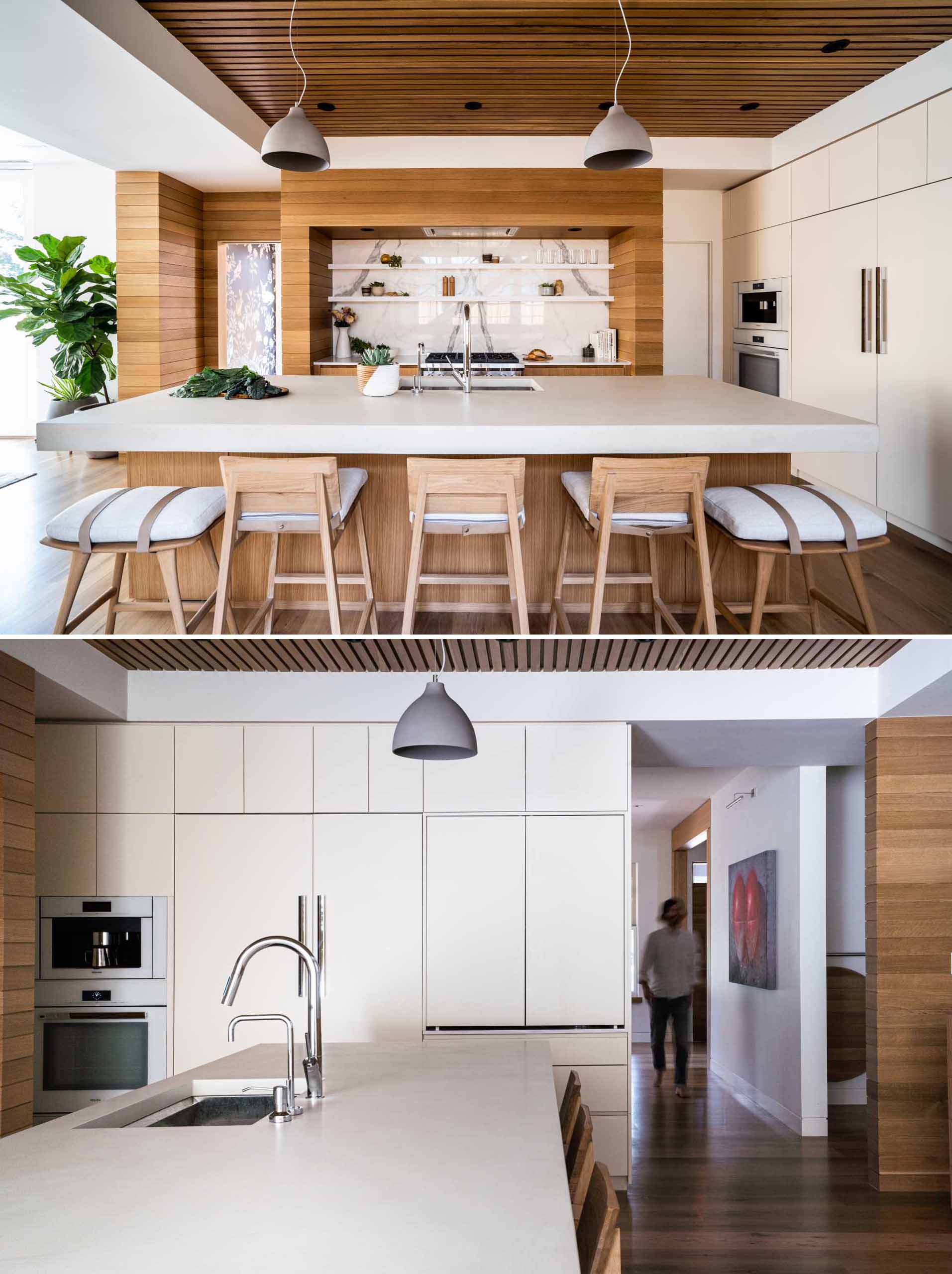 In this modern kitchen, wood has been paired with light-colored cabinets.