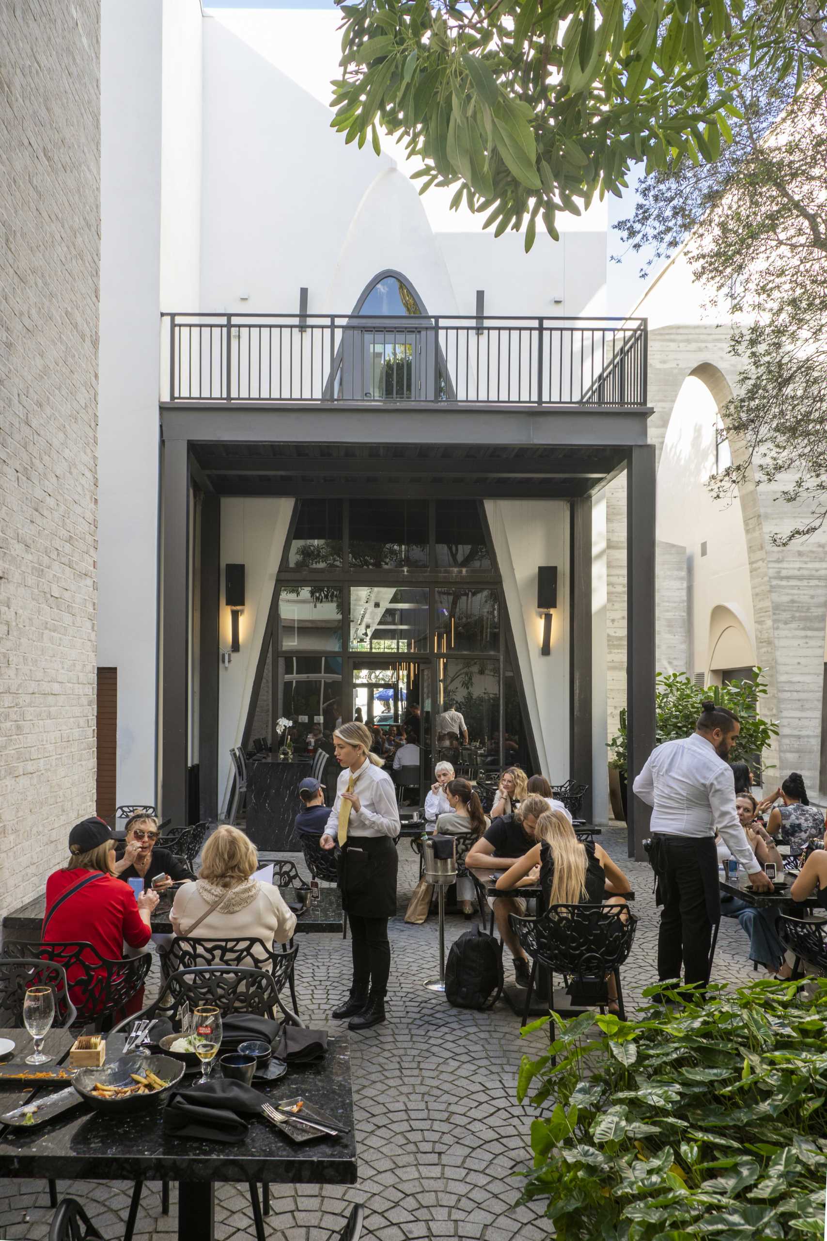 A series of arches were added to a nondescript alley to create an art installation that added life to the area.