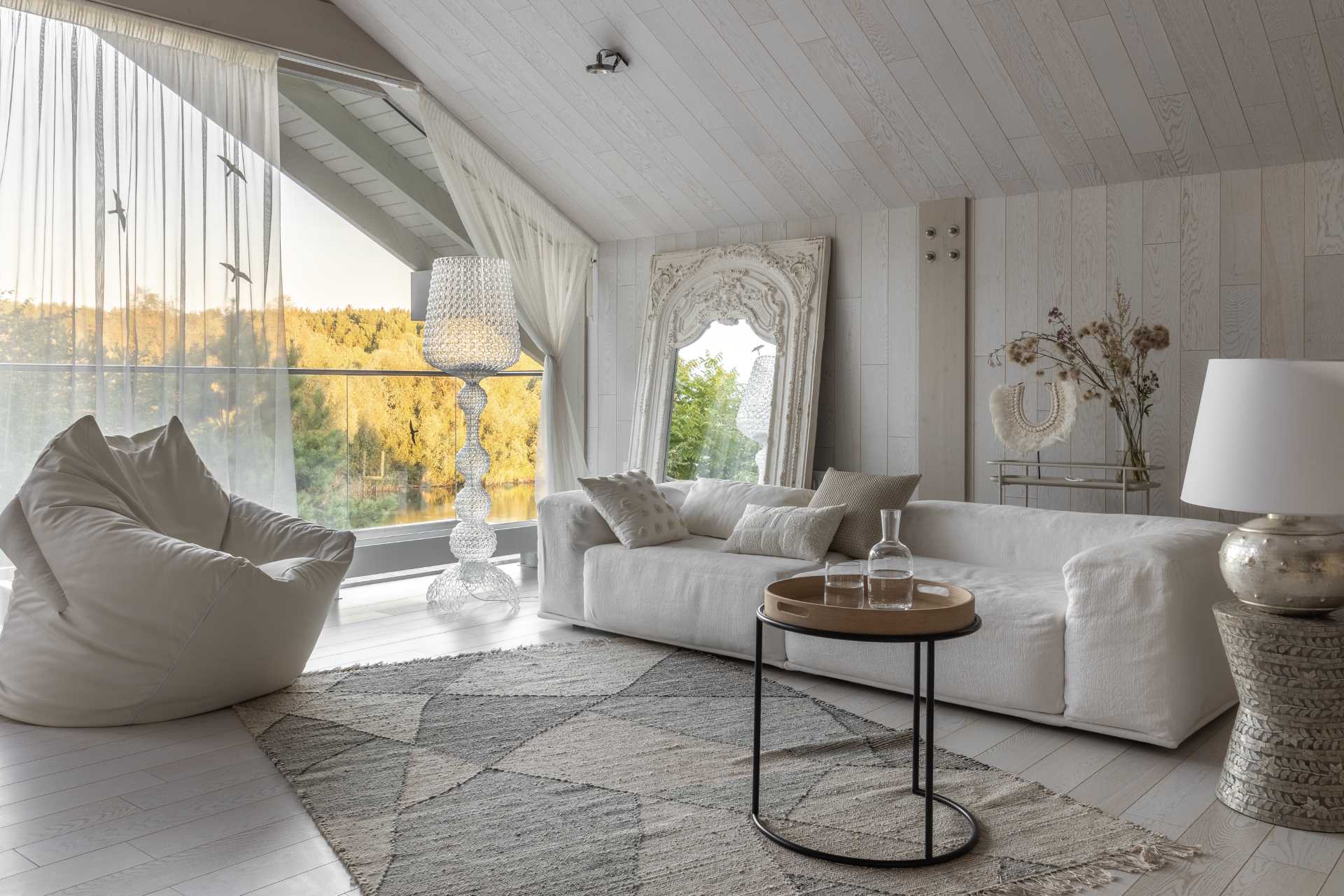 A casual living room where materials and objects were chosen to be as tactile and warm as possible.