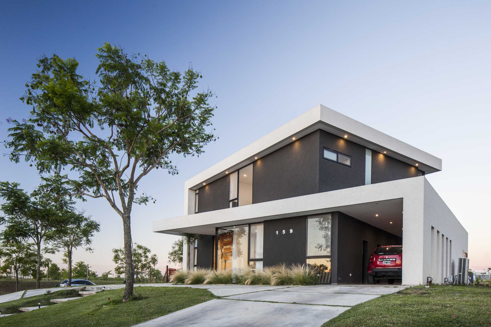 A modern home whose shape is based on the idea of turning boxes.