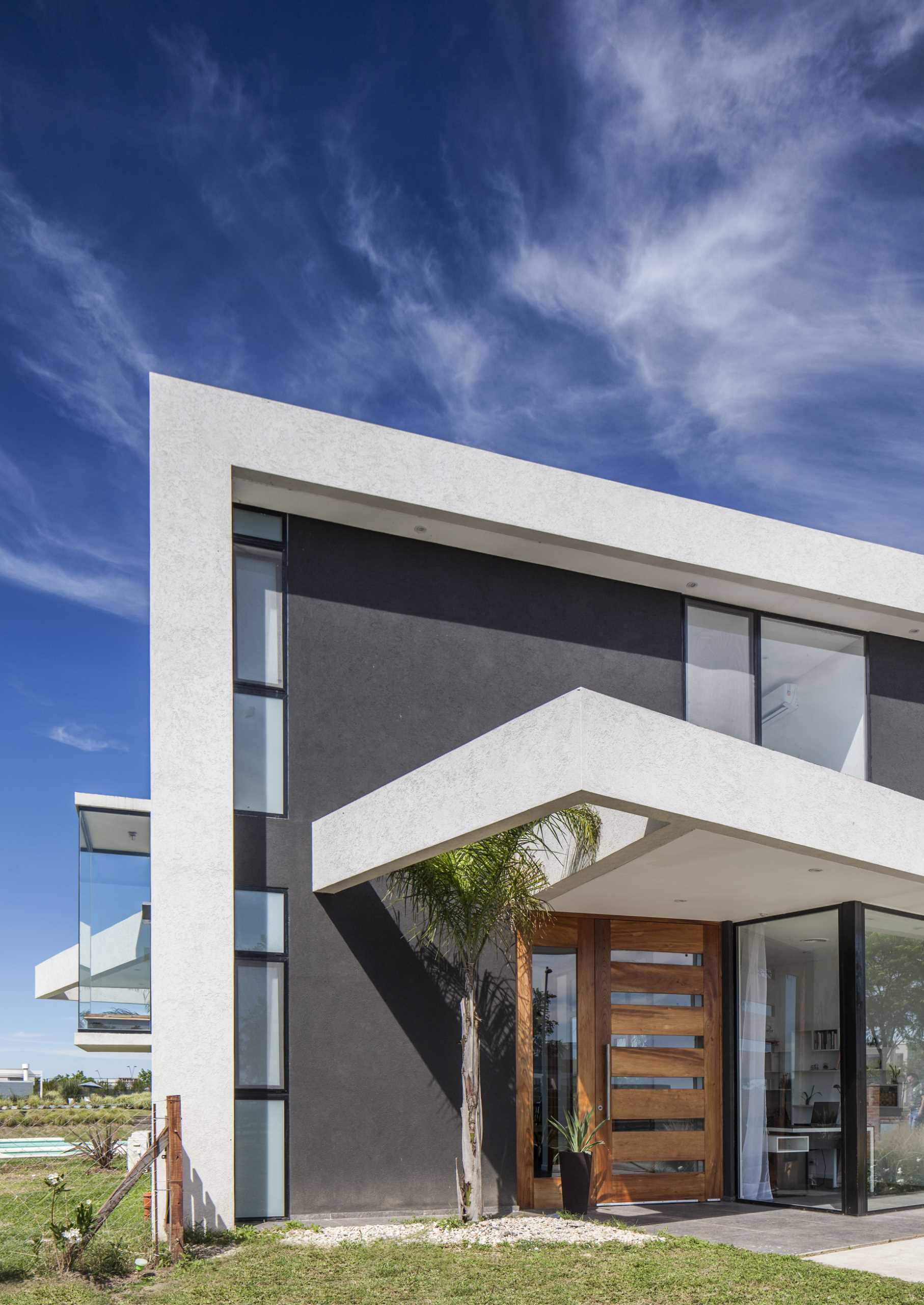 A modern home whose shape is based on the idea of turning boxes.