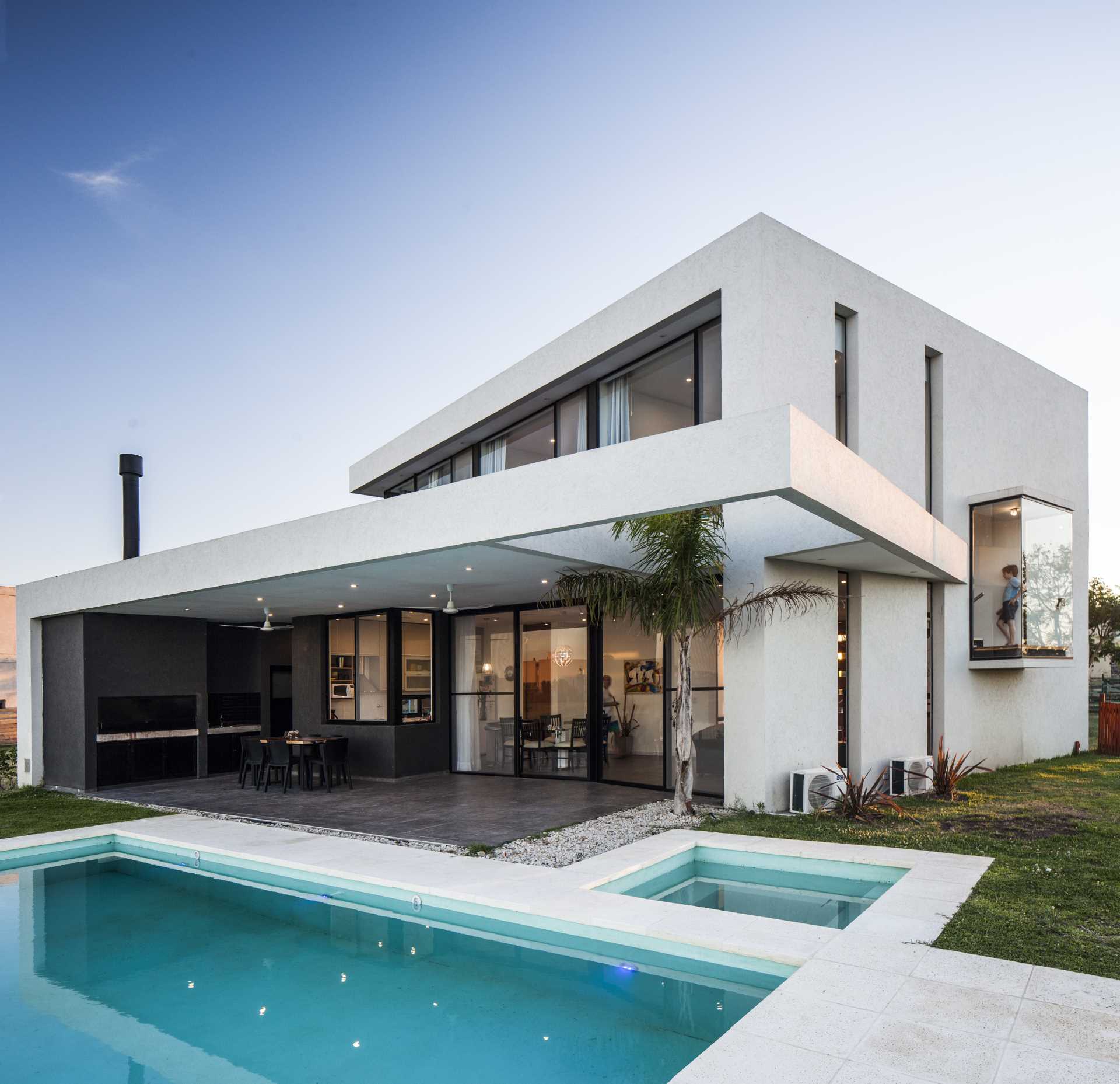 A modern home whose design is based on the idea of turning boxes.