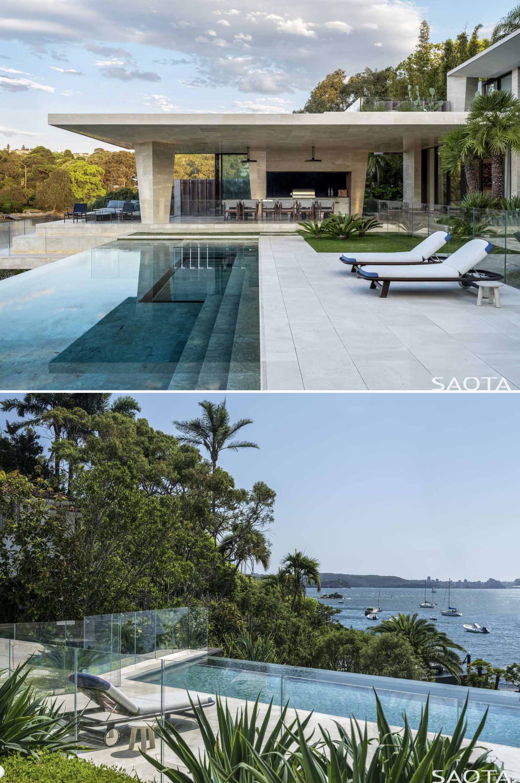 A large pavilion by the swimming pool provides a place for an outdoor kitchen and dining area, and a spot to enjoy the view.