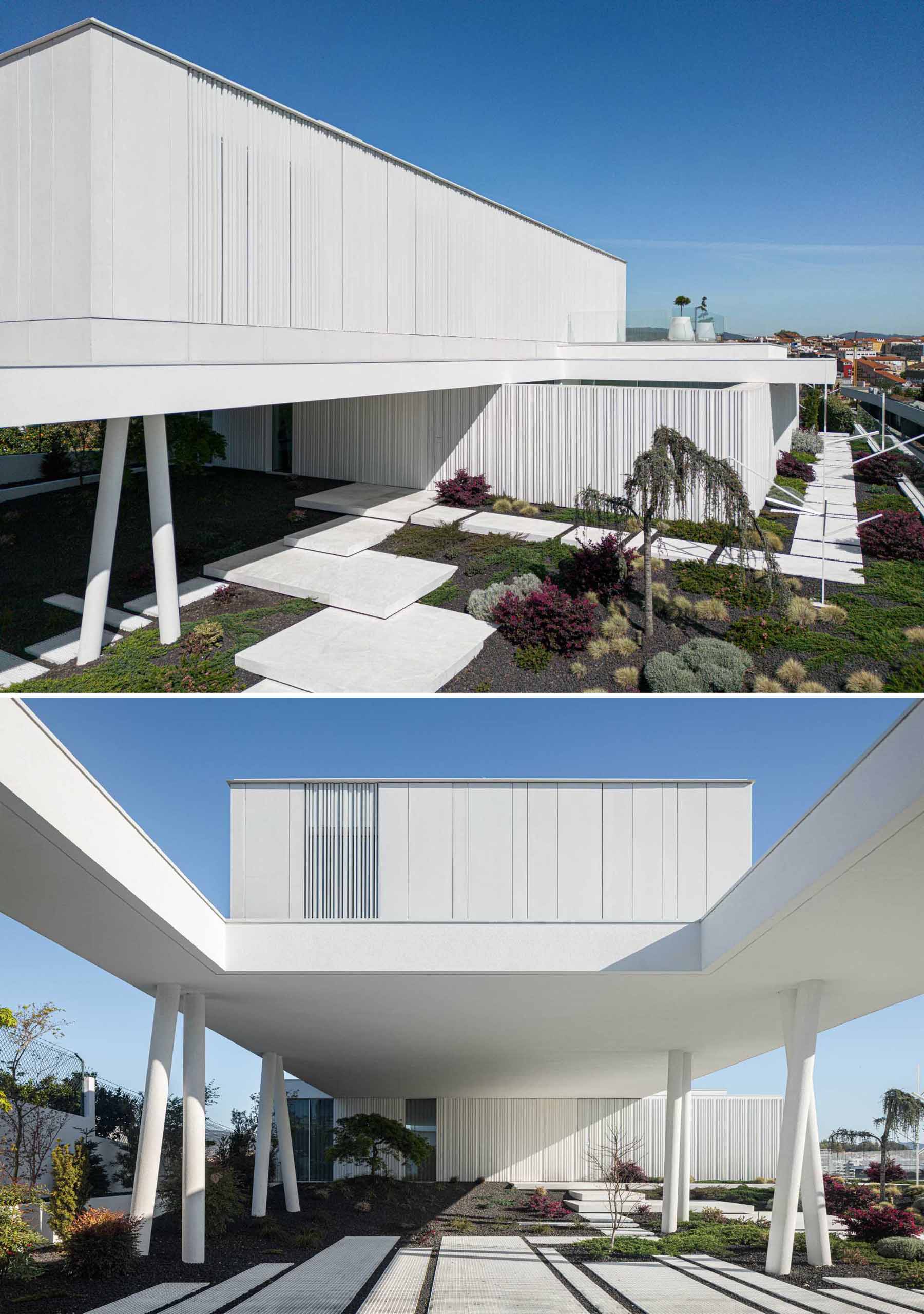 Pathways with landscaping greet visitors, while the path leads underneath the upper level to the front door, as well as along the side of the home.
