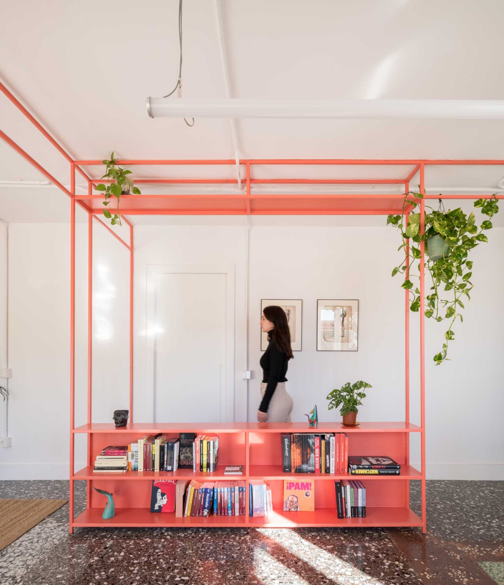 View of A Brightly Coloured Shelving Unit Helps To Define Areas In This ...