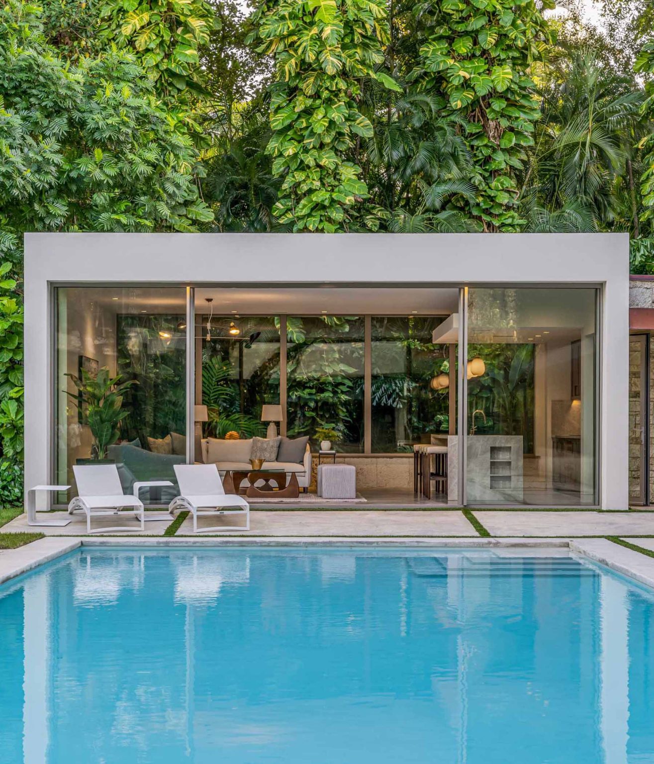 A Pool House And Loggia Enhance This Lush Backyard Experience