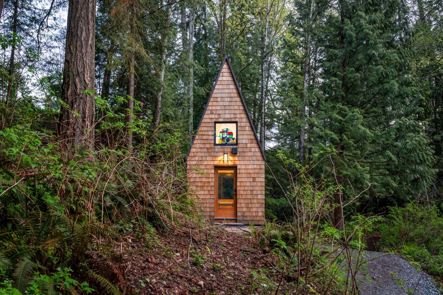 A small shingle-clad chapel.