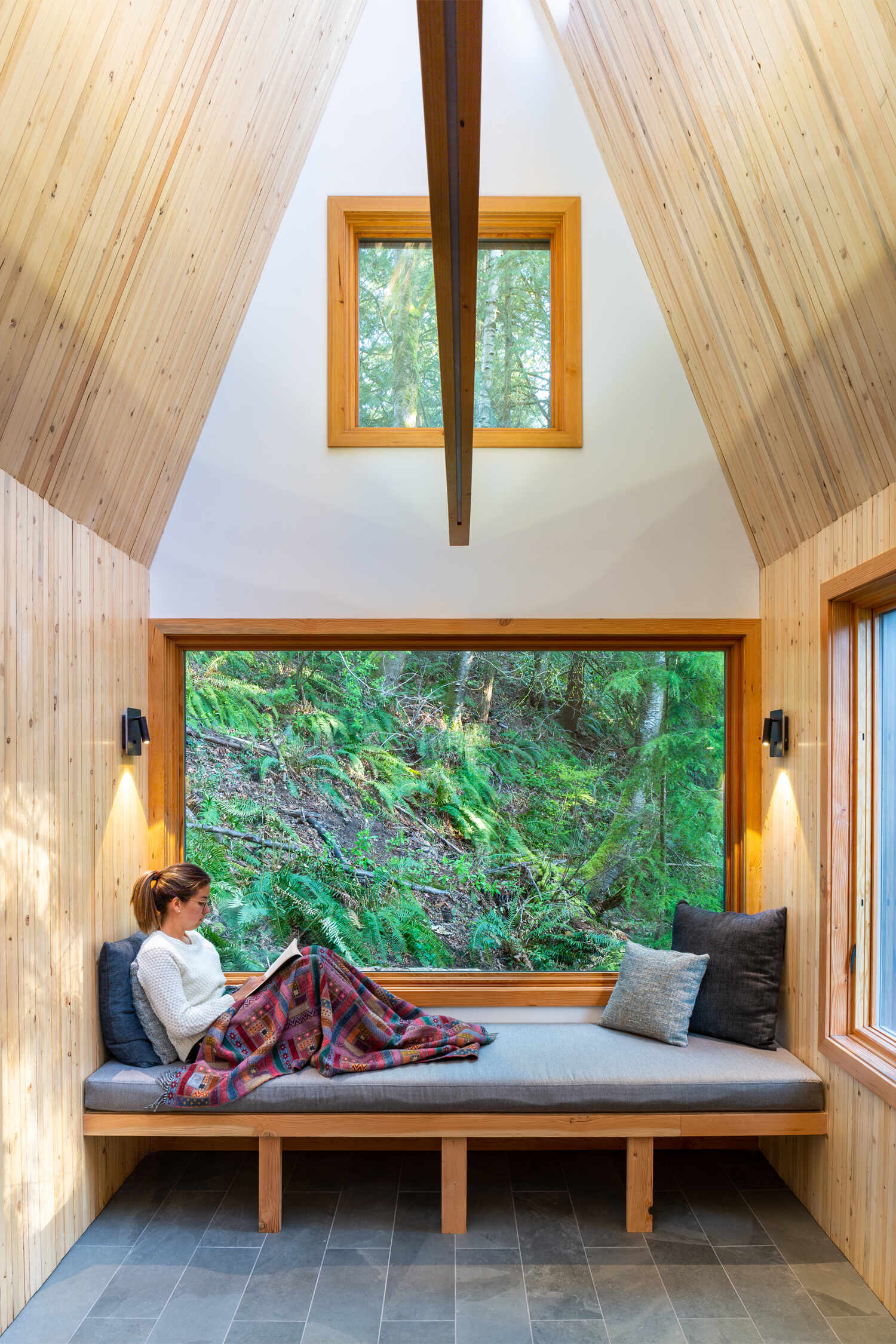 A small shingle-clad chapel.