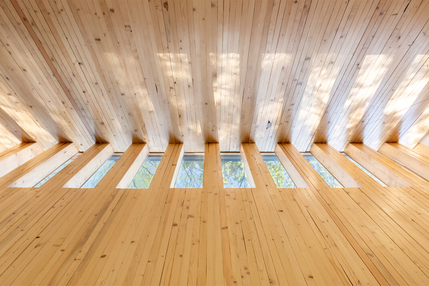 A small shingle-clad chapel.