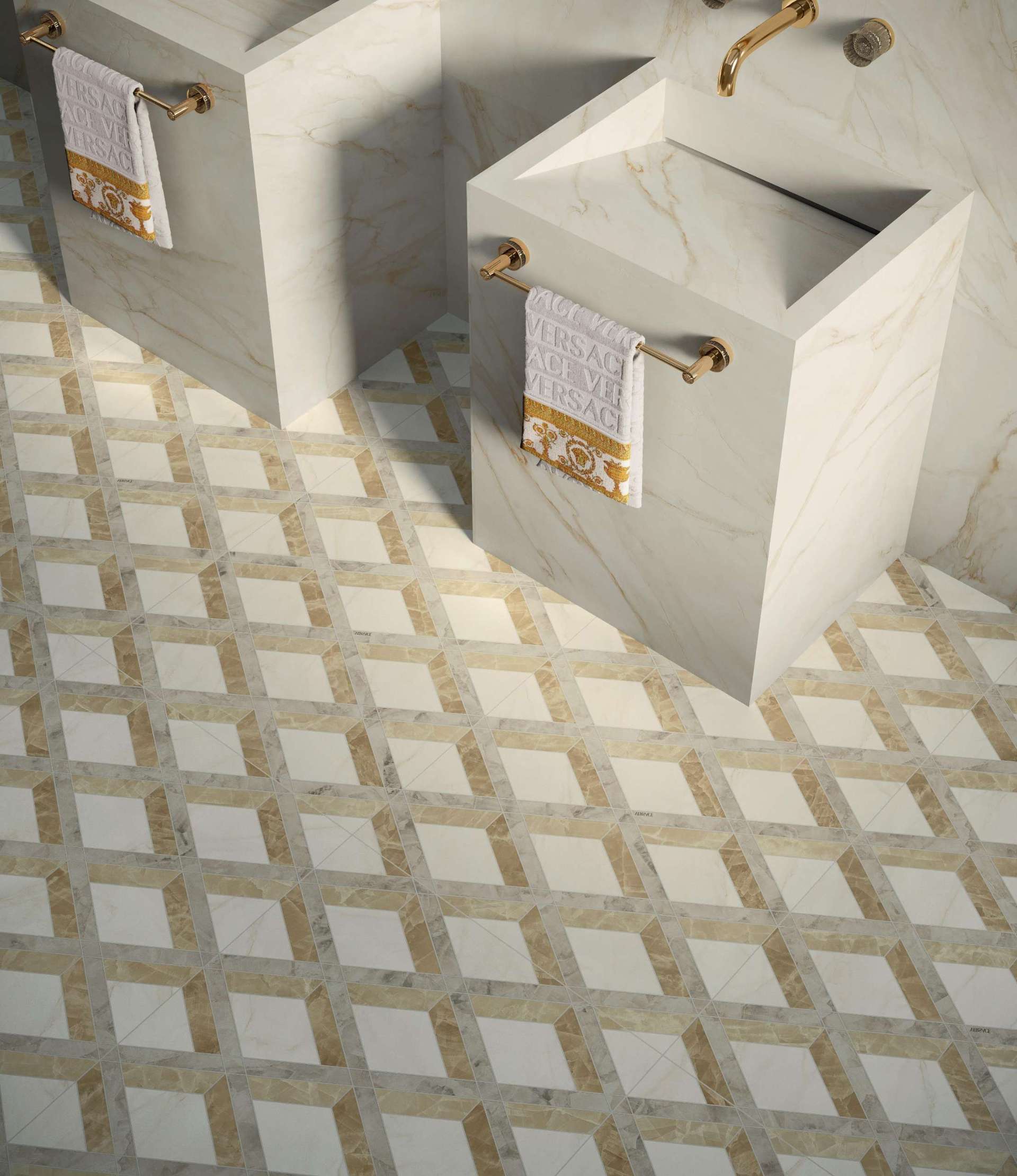 This luxurious bathroom floor blends warm-toned marble with an intricate geometric tile pattern that feels both Art Deco and fashion-forward. The soft gold accents, sculptural sink design, and branded towels elevate the space into a curated moment of glamour.