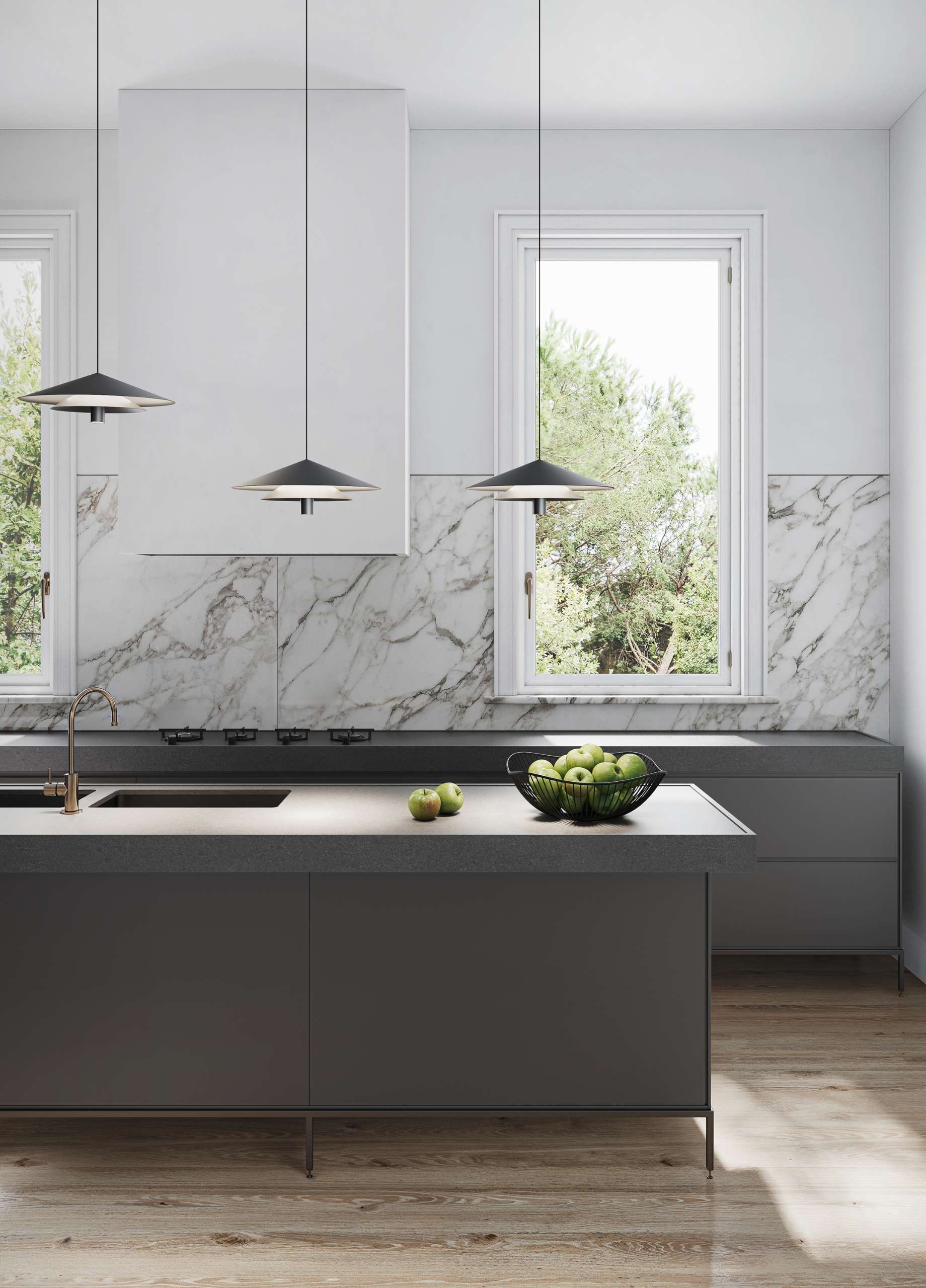 Modern lighting idea for kitchens. The Asso pendant light by Karman adds a clean, architectural touch over the island while casting a soft, focused glow. A perfect balance of form and function.