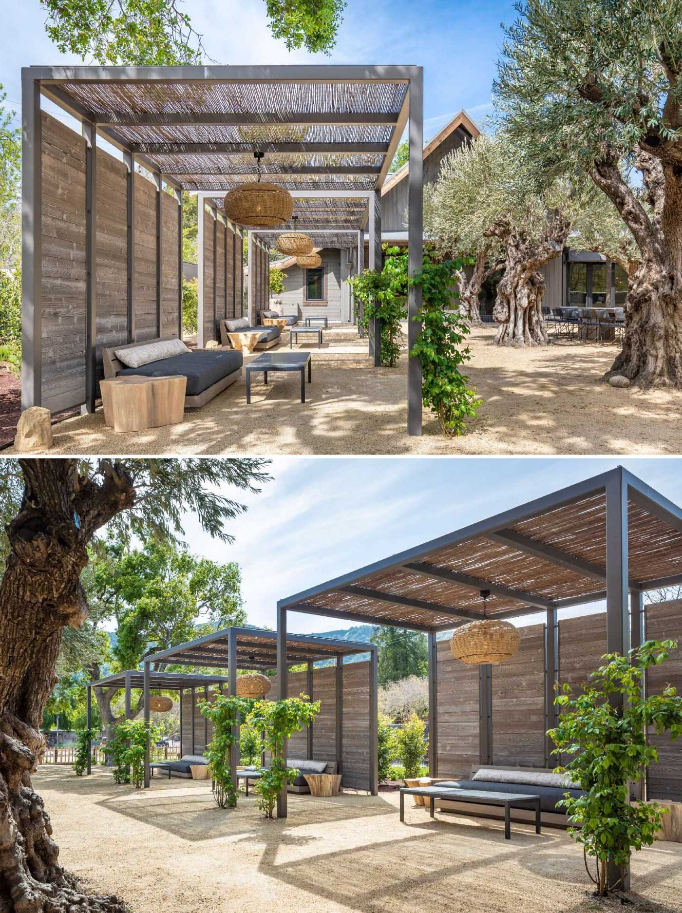 Hewn wood siding wraps the barn’s walls, while a canvas-topped trellis creates a shaded, low-key entrance. Separate group tasting areas feature willow-branch trellises and soft lighting, designed to work as well for late afternoons as they do for golden hour.
